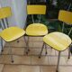 3 canary yellow formica chairs