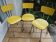 3 canary yellow formica chairs