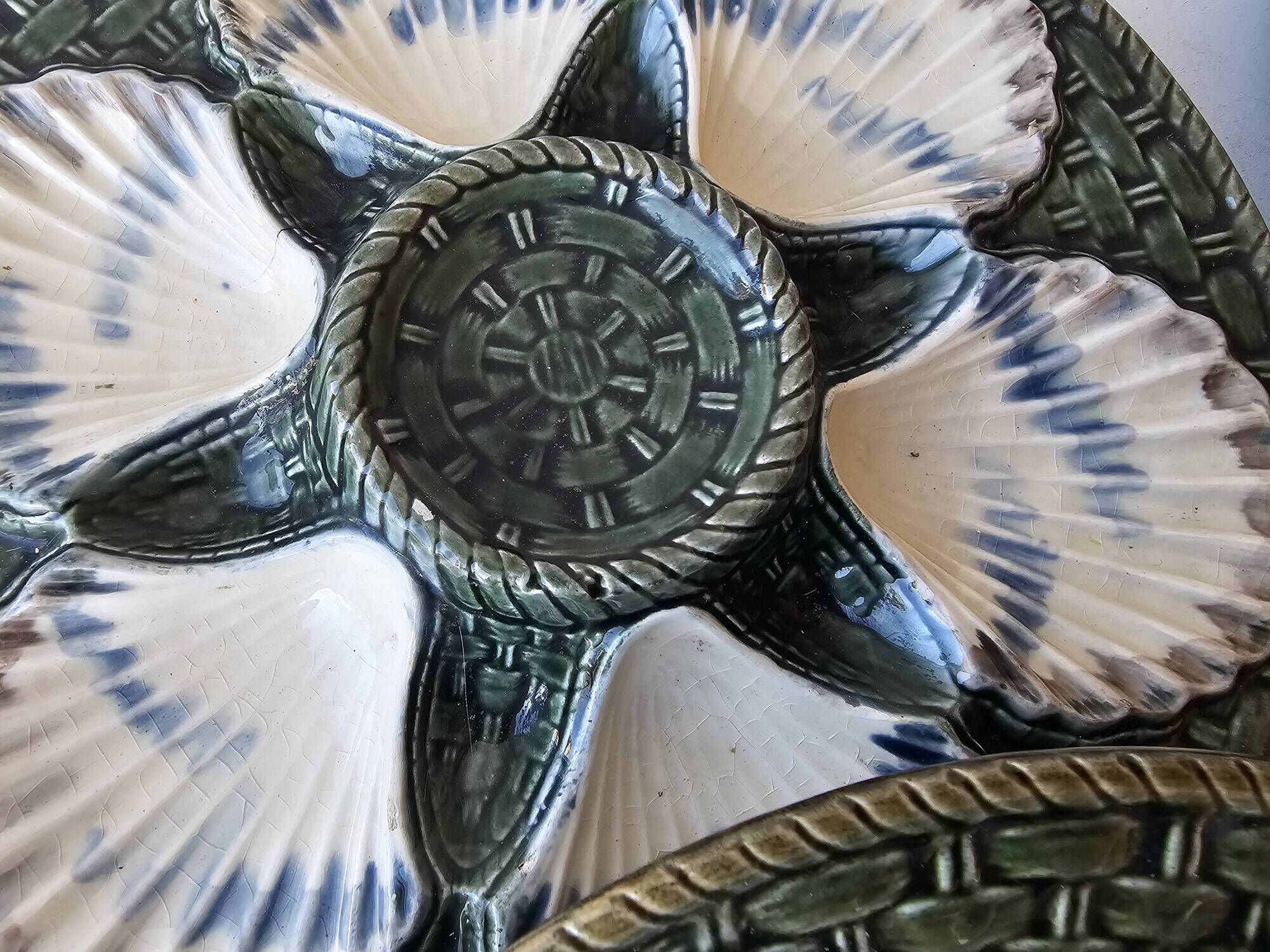 Set of 4 vintage green and white majolica oyster plates.