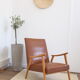Fauteuil skaï et bois 50's
