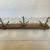 Old coat rack wood metal three hooks