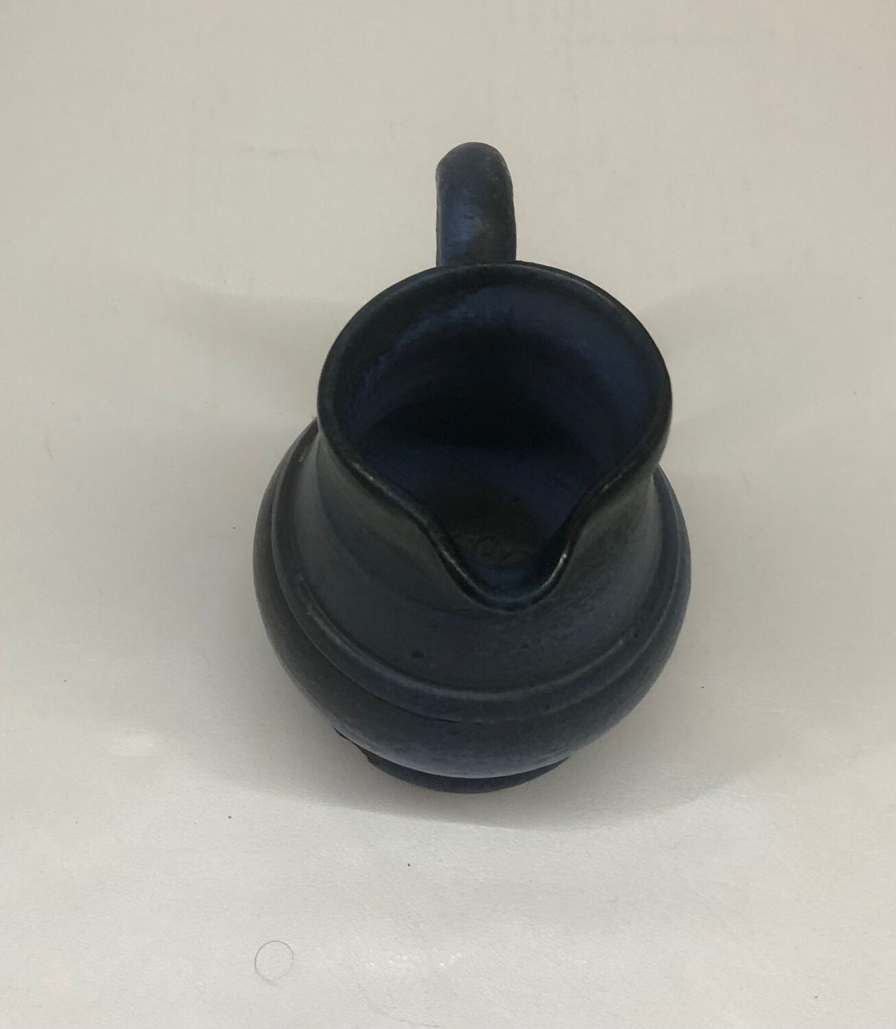 Ceramic pitcher by Roland Tostivint