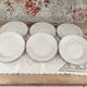 Set of 6 small white porcelain dinner plates with gold trim