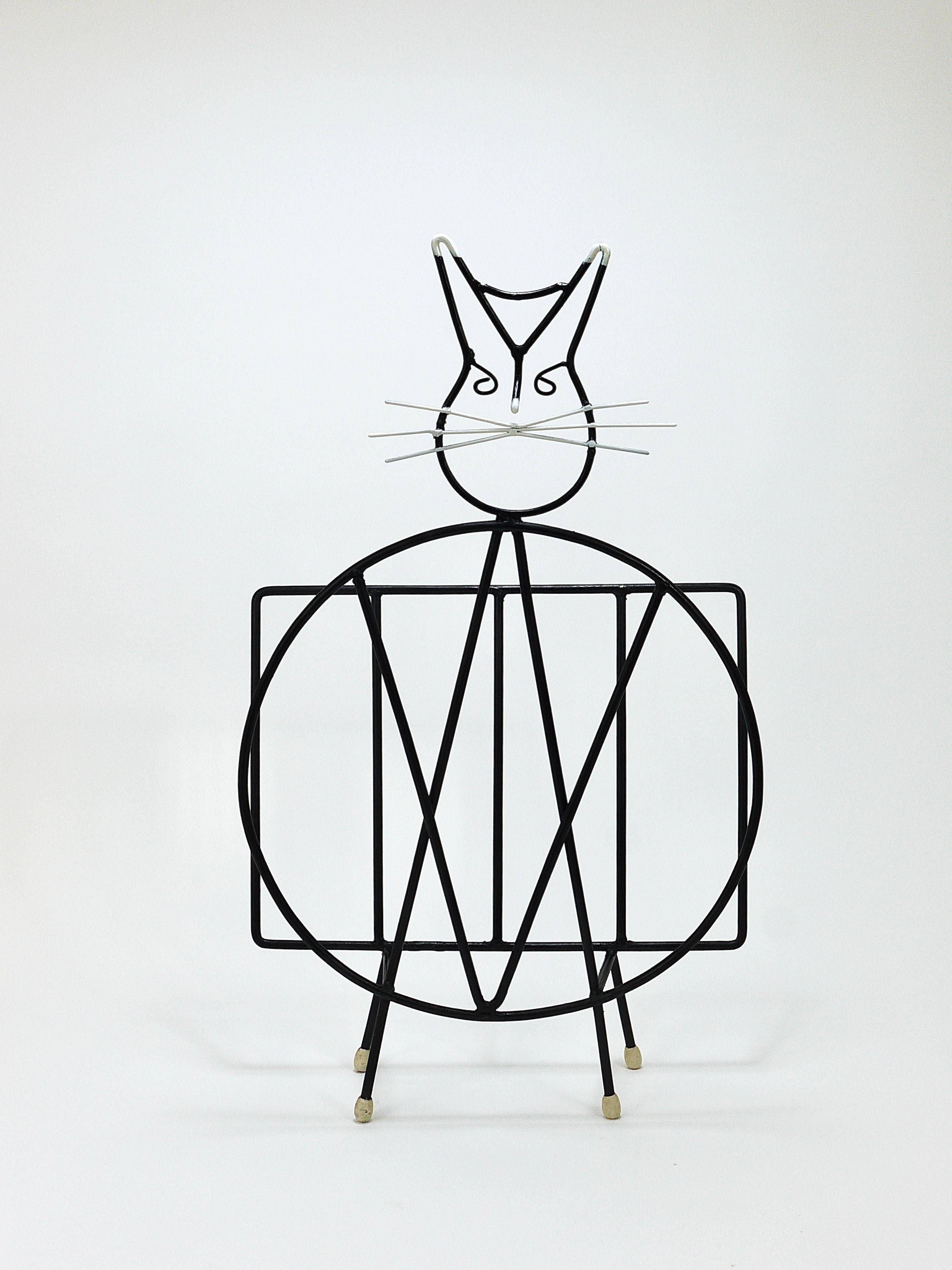 Mid-century cat-shaped magazine or record holder, iron, Italy, 1950s.