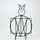 Mid-century cat-shaped magazine or record holder, iron, Italy, 1950s.