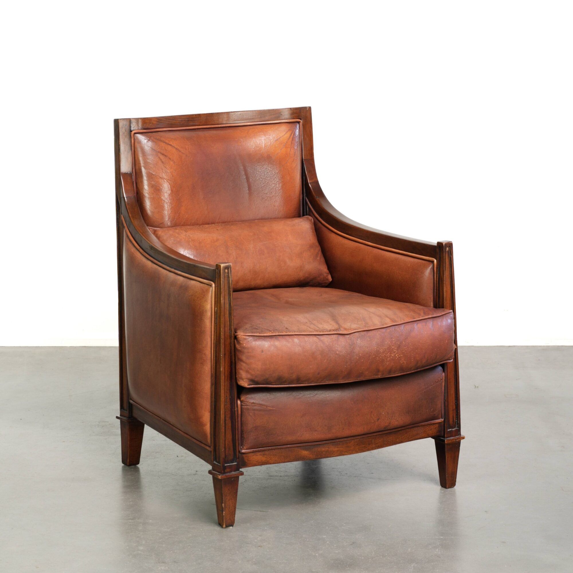 Sheepskin Art Deco design armchair with a comfortable seat and warm colours