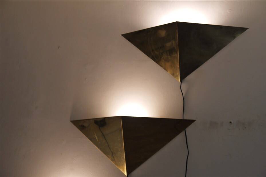 Minimalist brass wall lights
