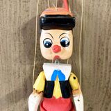 Painted wooden Pinocchio puppet