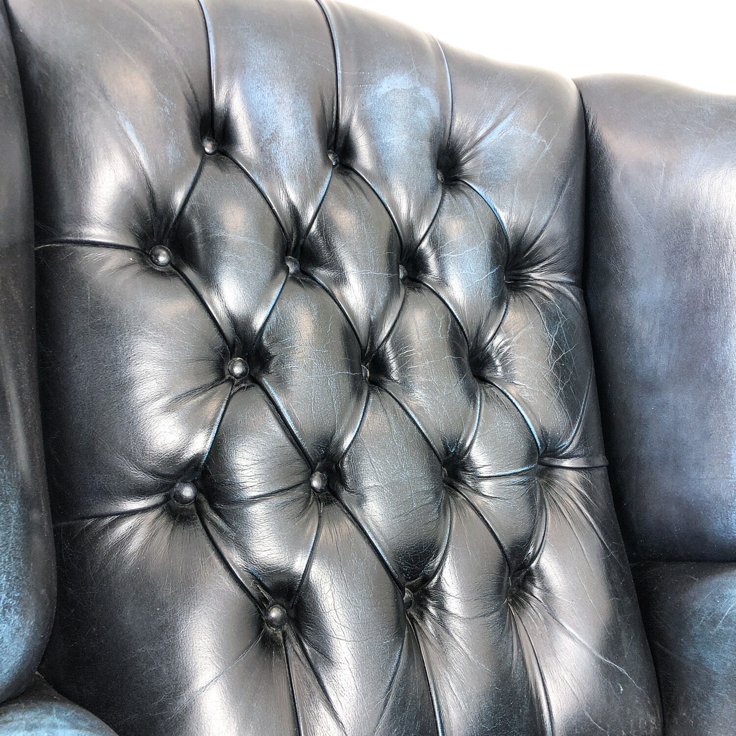 Vintage blue leather chesterfield armchair