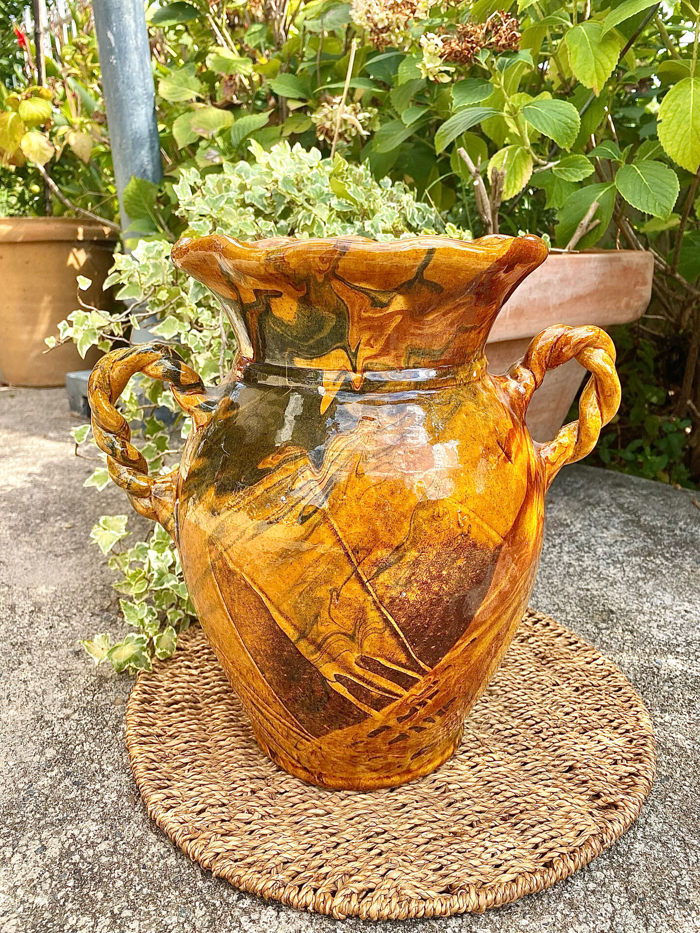 Ancient large vase in glazed speckled terracotta