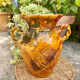 Ancient large vase in glazed speckled terracotta
