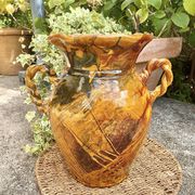 Ancient large vase in glazed speckled terracotta