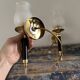 Pair of brass and black torchiere wall lights