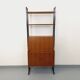 Vintage modular secretary bookshelf in teak and metal.