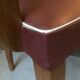 Skai chair binds wine and wooden footpieces and armrests