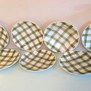 Set of six flat plates and one Moulin des Loups bowl, green tablecloth model/1950s-1960s