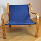 Scandinavian curved wooden armchairs