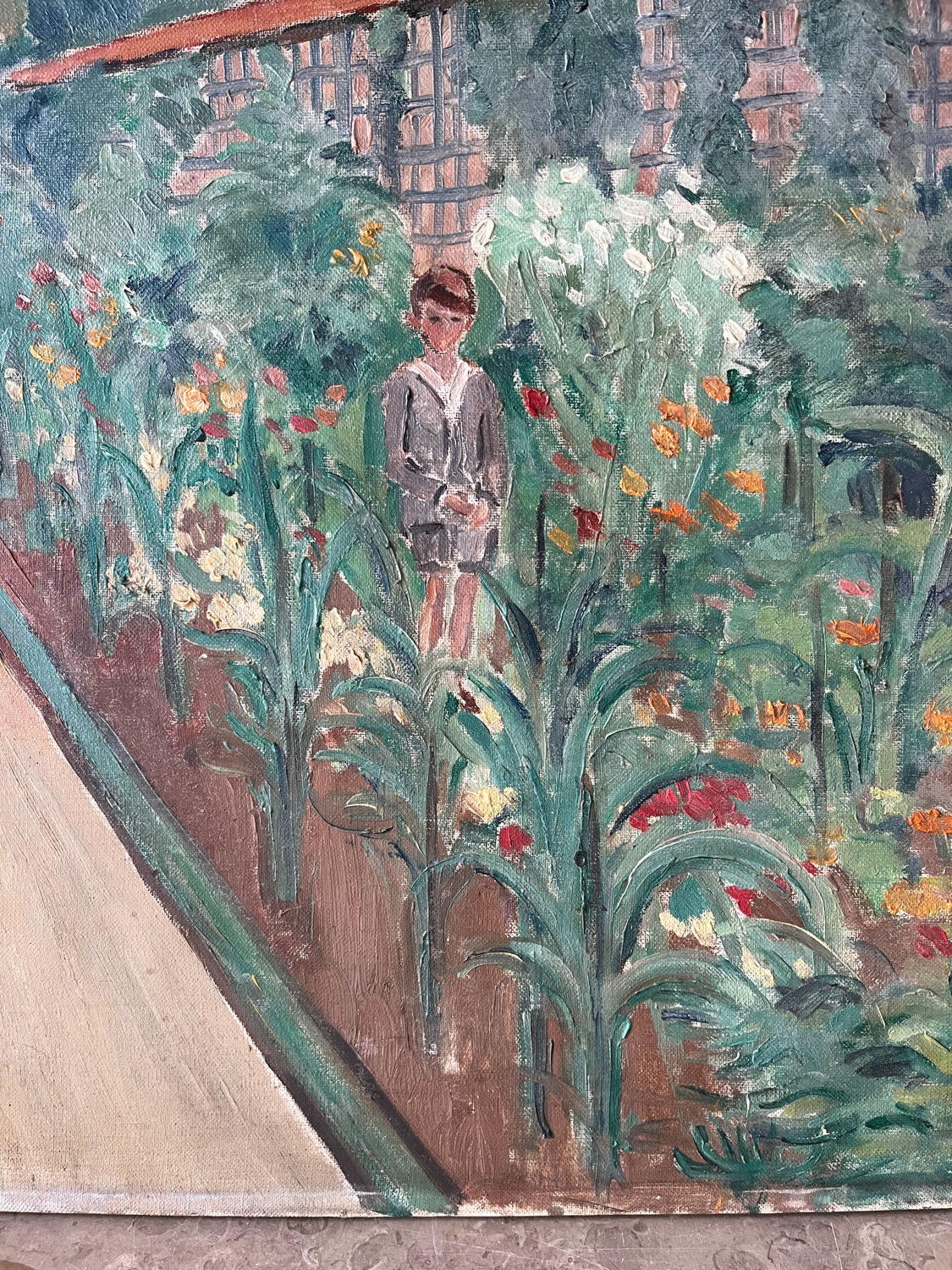 Country house with young man, signed Bernard Delafon