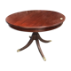 Round extendable dining table for six people, mahogany.