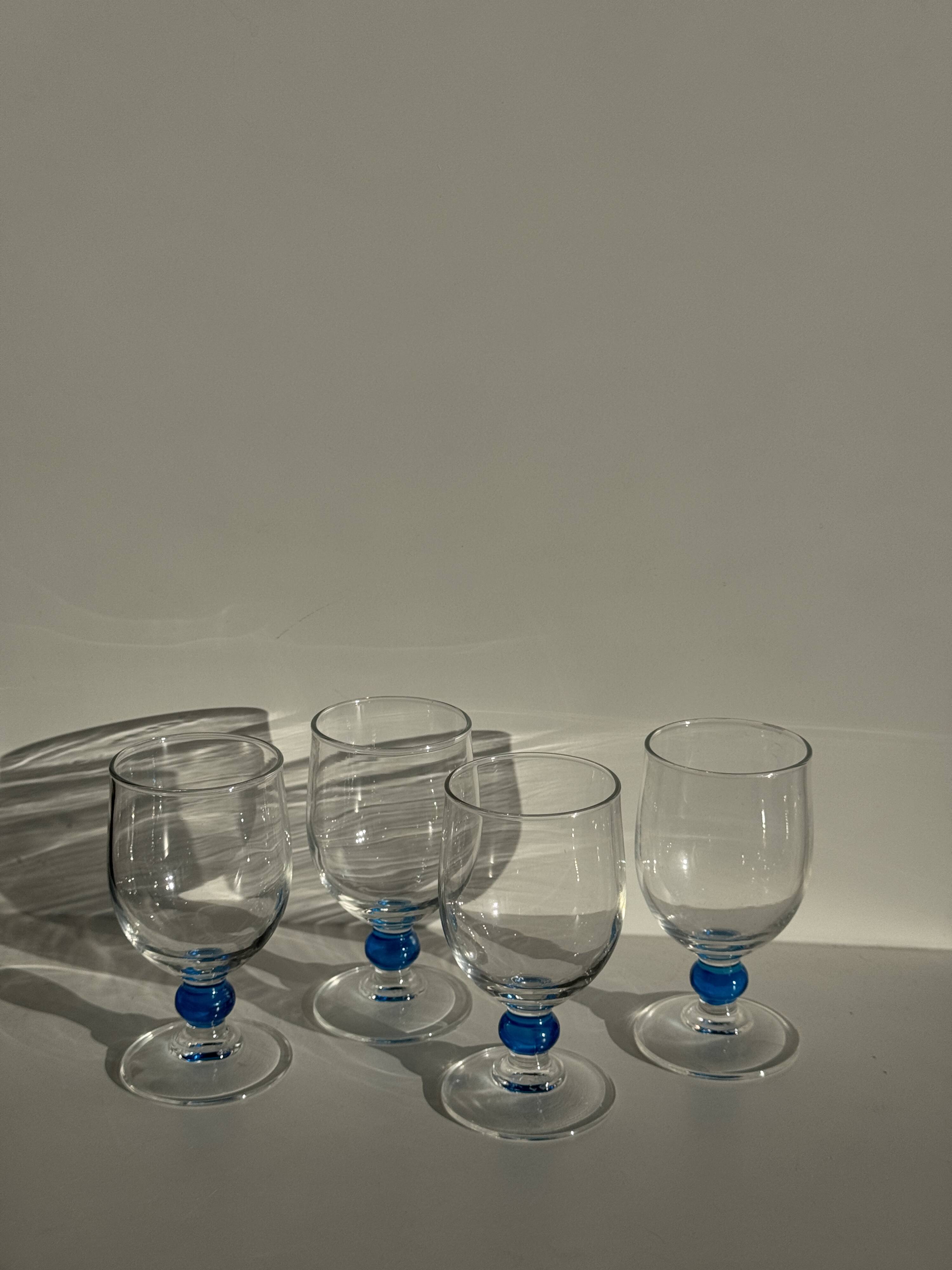 Set of 4 blue ball stemmed water glasses