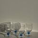 Set of 4 blue ball stemmed water glasses