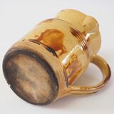Old pitcher with side handle
