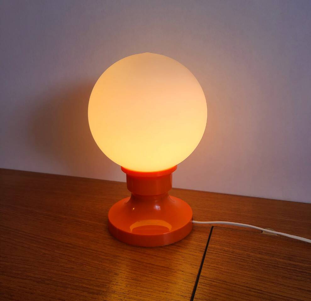 Vintage orange plastic bedside lamp