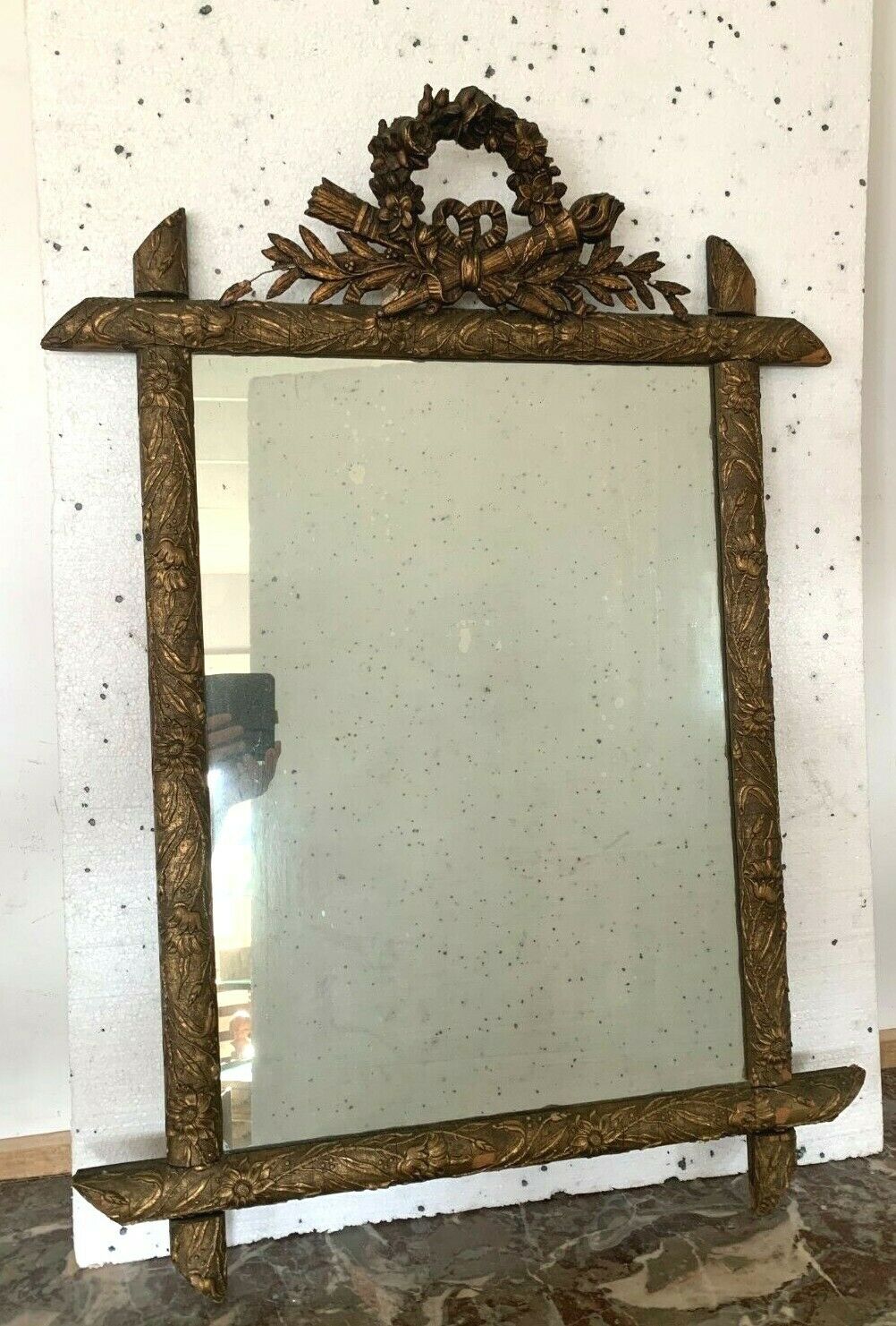 Louis XVI style mirror in wood and patinated stucco XX century 105 X  75cm