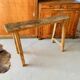 Primitive raw wood console
