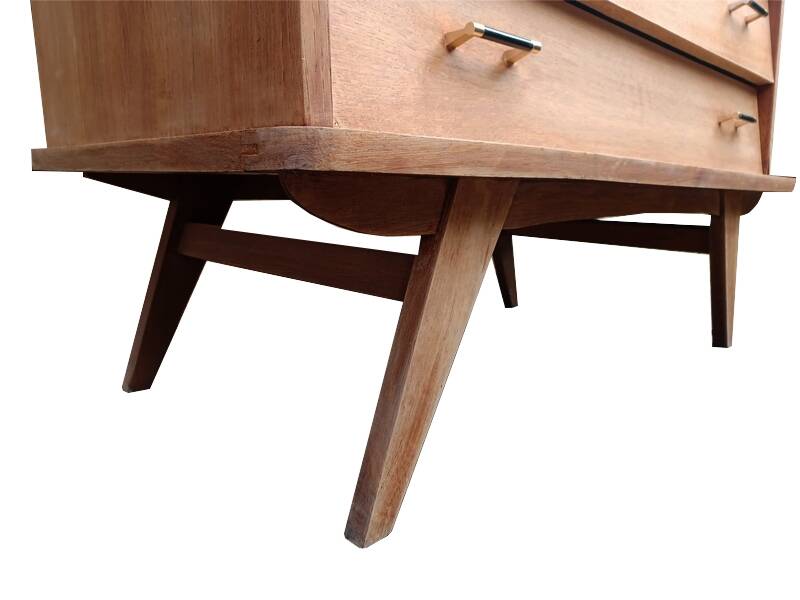 Renovated vintage commode from the 1960s in oak with slanted profile and tapered legs.