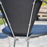 4 chrome and leather chairs designed by Italy