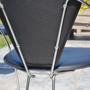 4 chrome and leather chairs designed by Italy