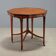Antique octagonal coffee table made of lemon wood, 20th century.