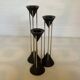 Vintage black candlestick trio