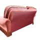 Vintage pink two-seater sofa with fringes