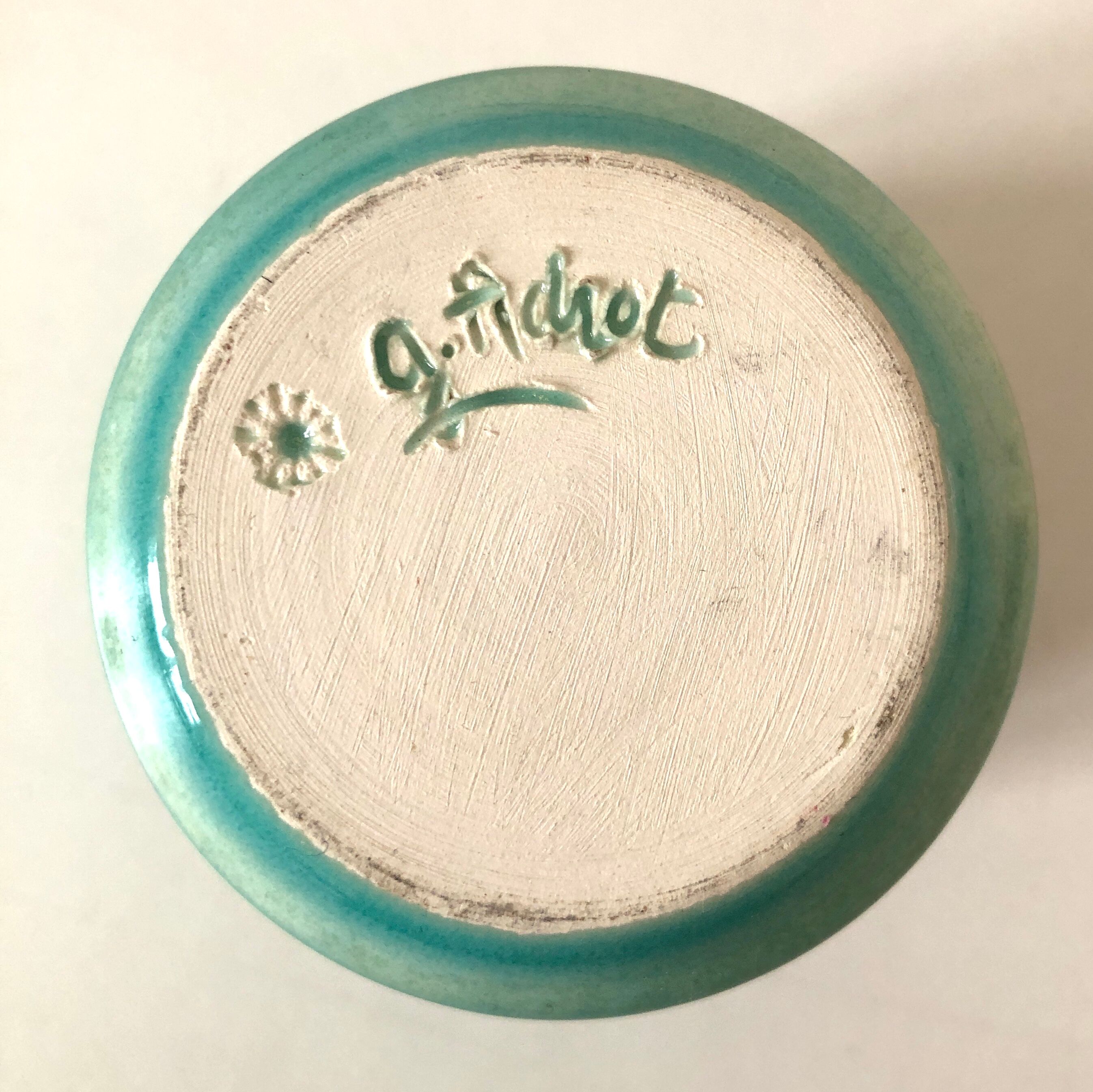 Signed ceramic turquoise cup
