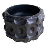 Brutalist wooden pocket emptier