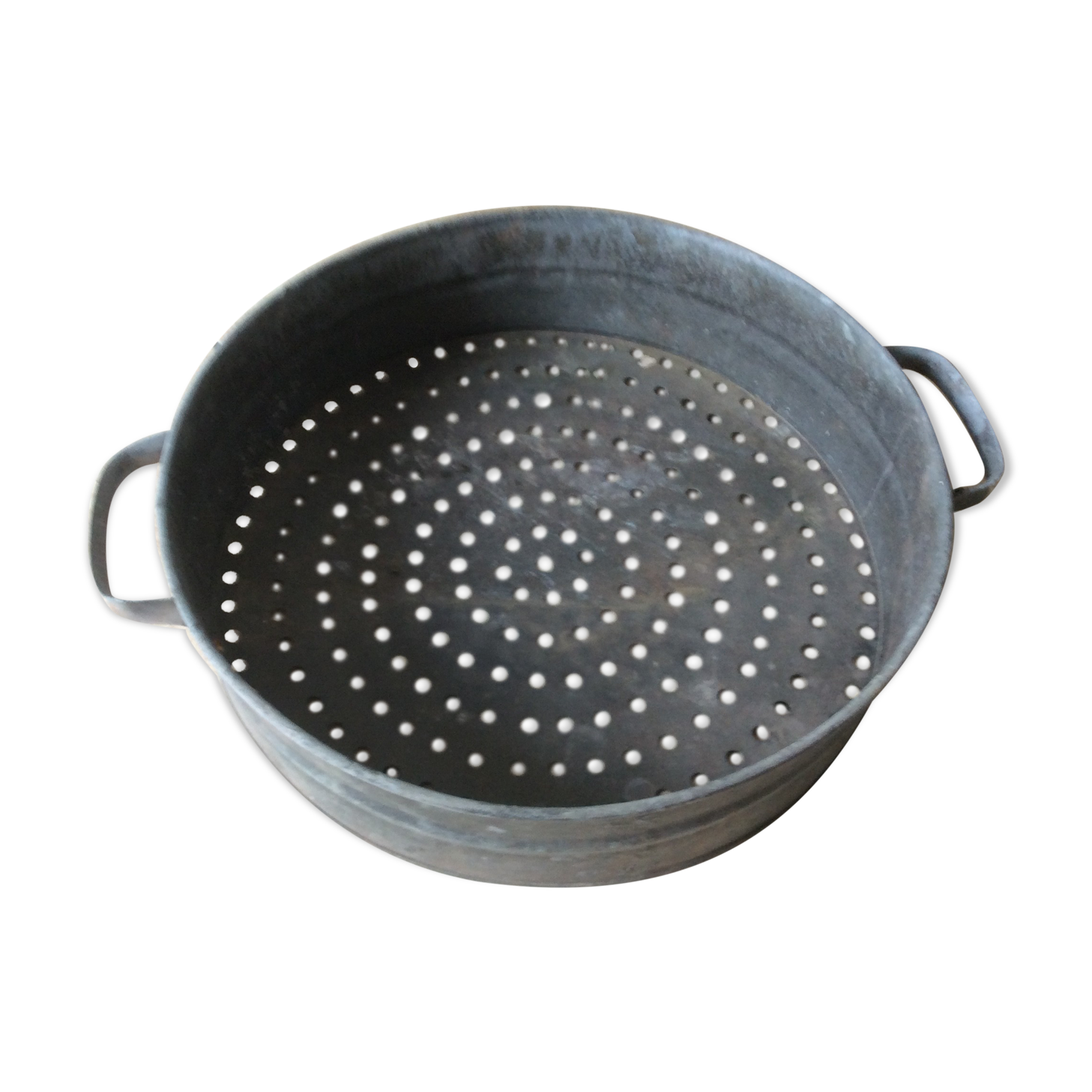 Ancient zinc sieve