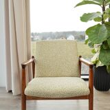 Vintage armchair with a green nebula design by E. Homa, 1970.