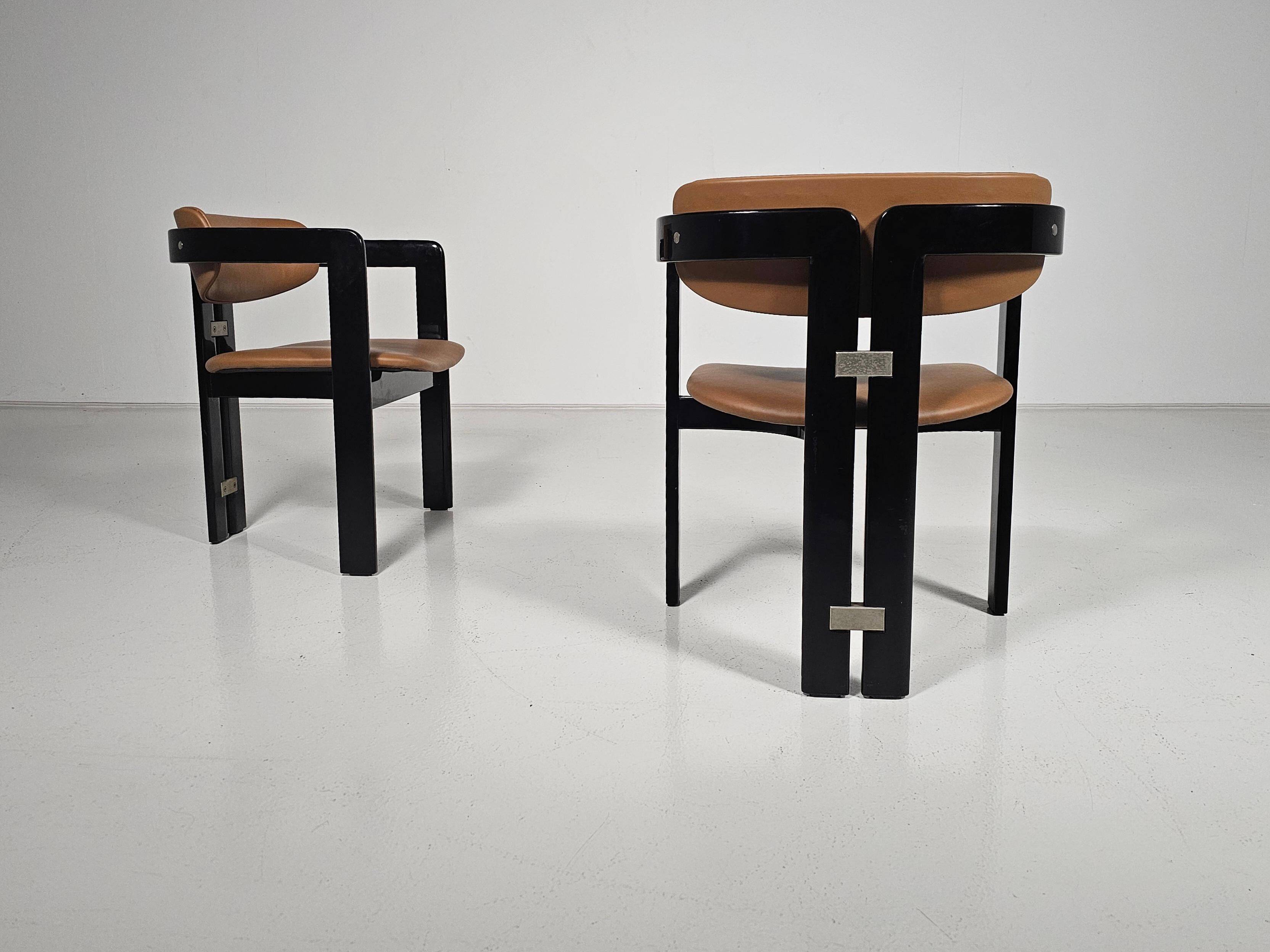 Set of two chairs by Augusto Savini, 1960s.