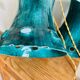 Green cast iron cascading chandelier