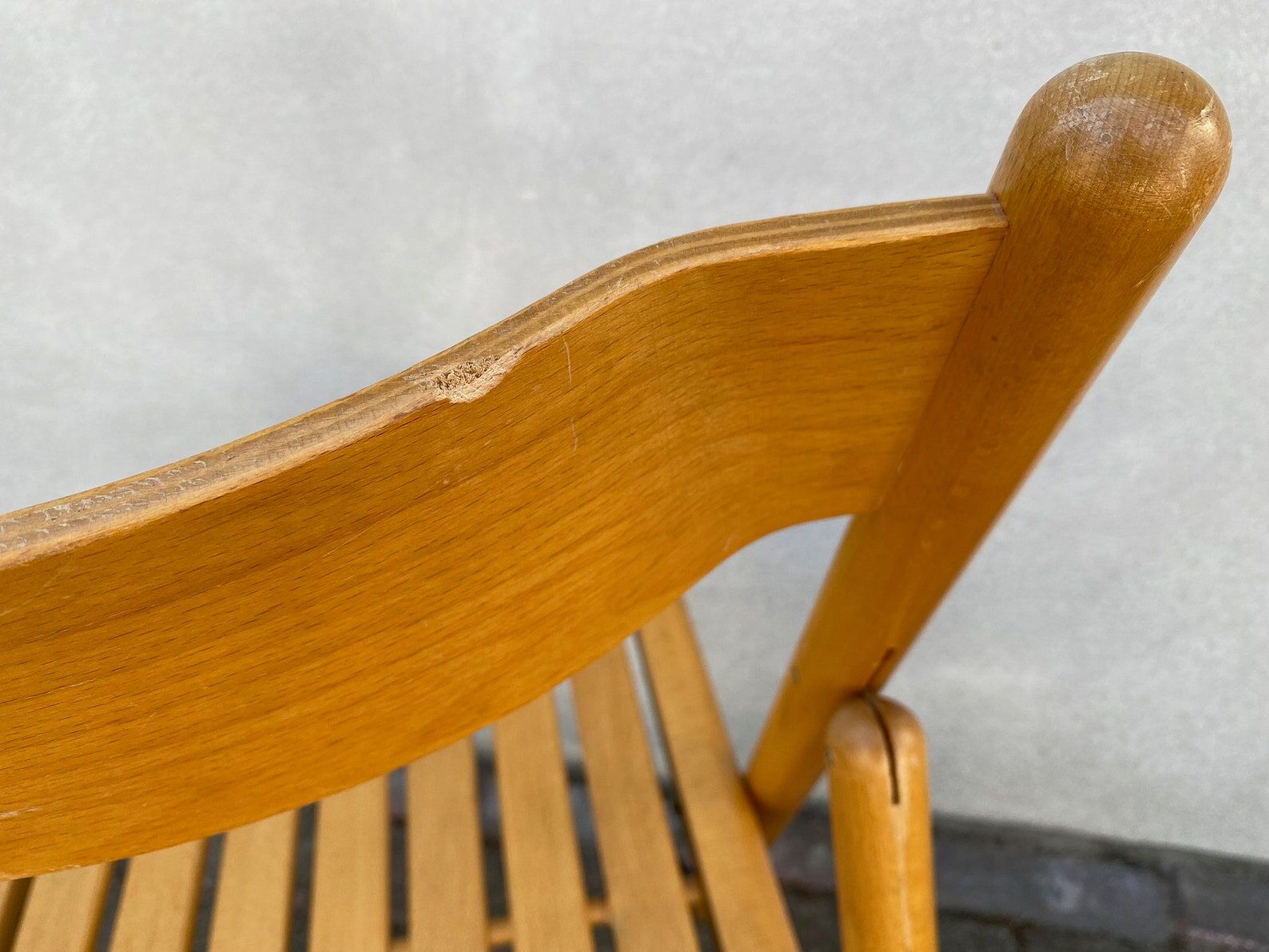Mid Century wooden folding chair with a slat seat