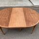 Renovated round extendable dining table made of solid mahogany from the 19th century.