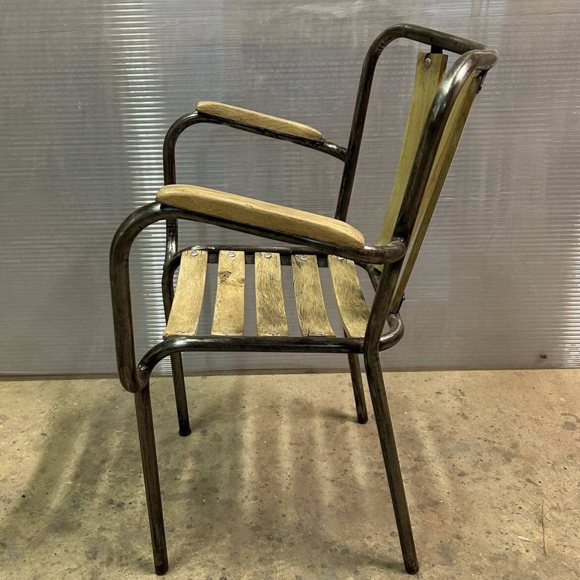 Industrial armchair in metal and wood