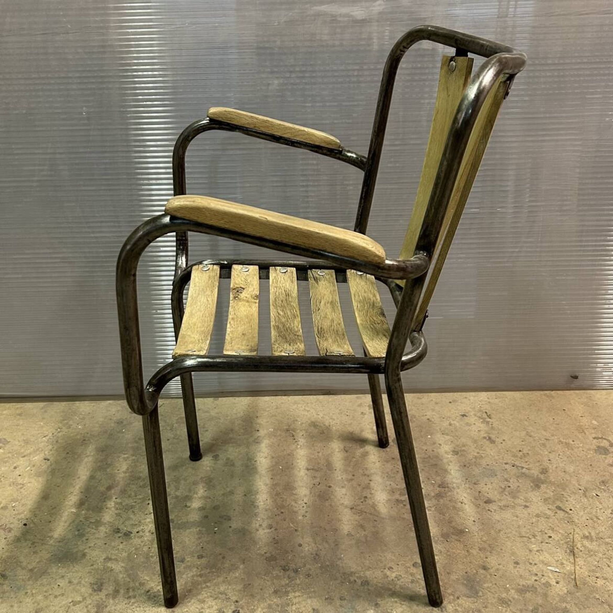 Industrial armchair in metal and wood