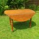 Folding wooden round table – Ø 115 cm