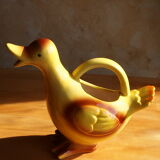 Ceramic watering can in white earthenware, yellow enamel and bird shape