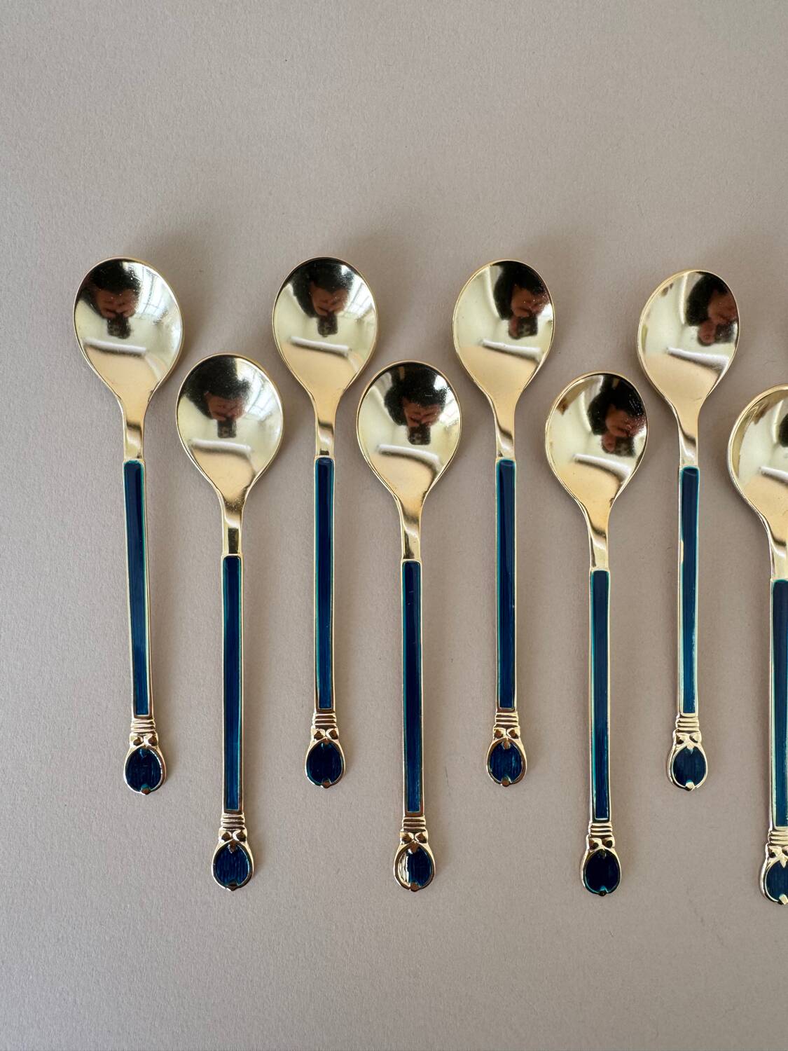 Vintage set of 12 Mid Century Modern gold colored Japanese stainless s