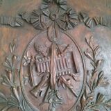 Carved wooden panel décor with music trophy