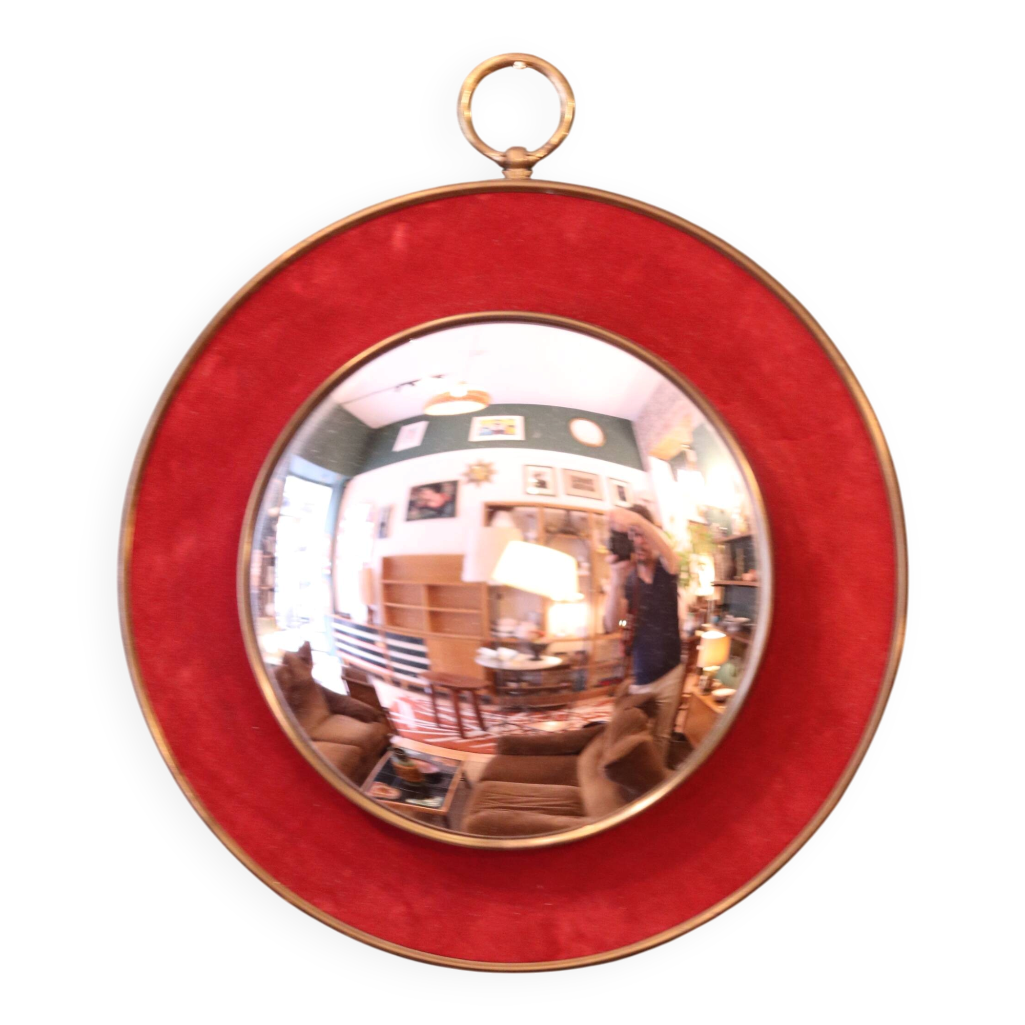 Witch's eye mirror in brass and red velvet